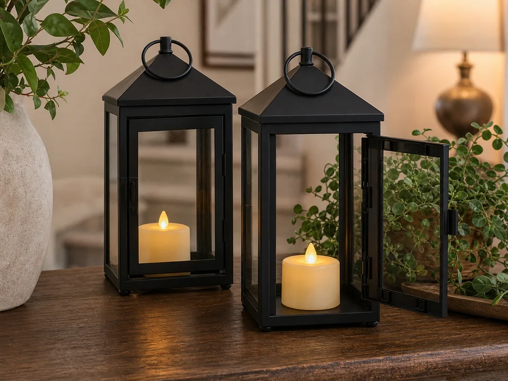 battery operated candles for lanterns with short ivory LED pillar candles inside black lanterns