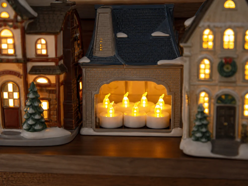 LED tea lights for Christmas village displays in a realistic electronic candle scene